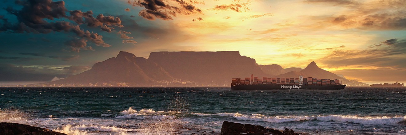 Hapag-Lloyd vessel on the ocean, passing Cape Town in South Africa
